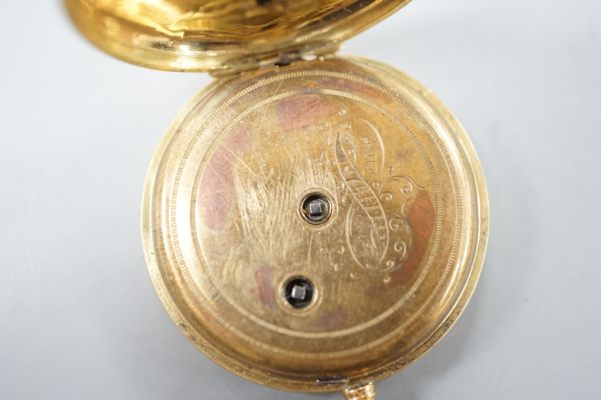 An 18k open faced keywind fob watch, with Roman dial, case diameter 33mm, gross 29.4 grams.